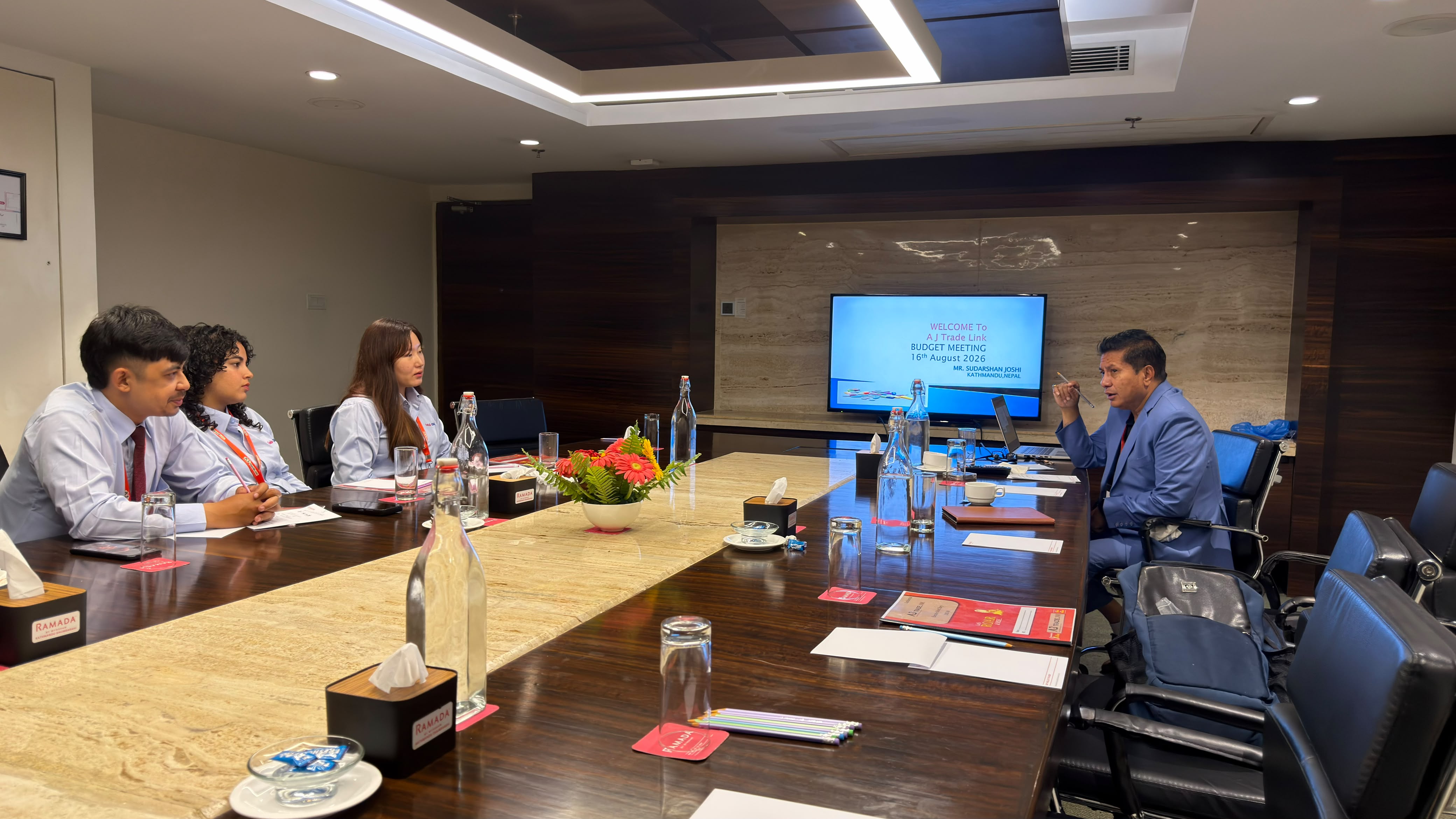Conference room discussion during the budget meeting.